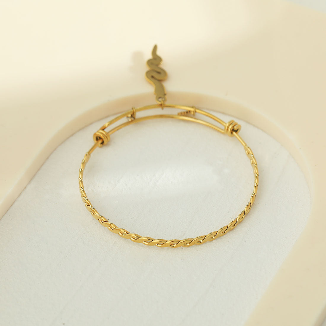 CATALINA Gold: Bracelet with Serpent, Sun Symbol and Zirconia (CZ) Charms