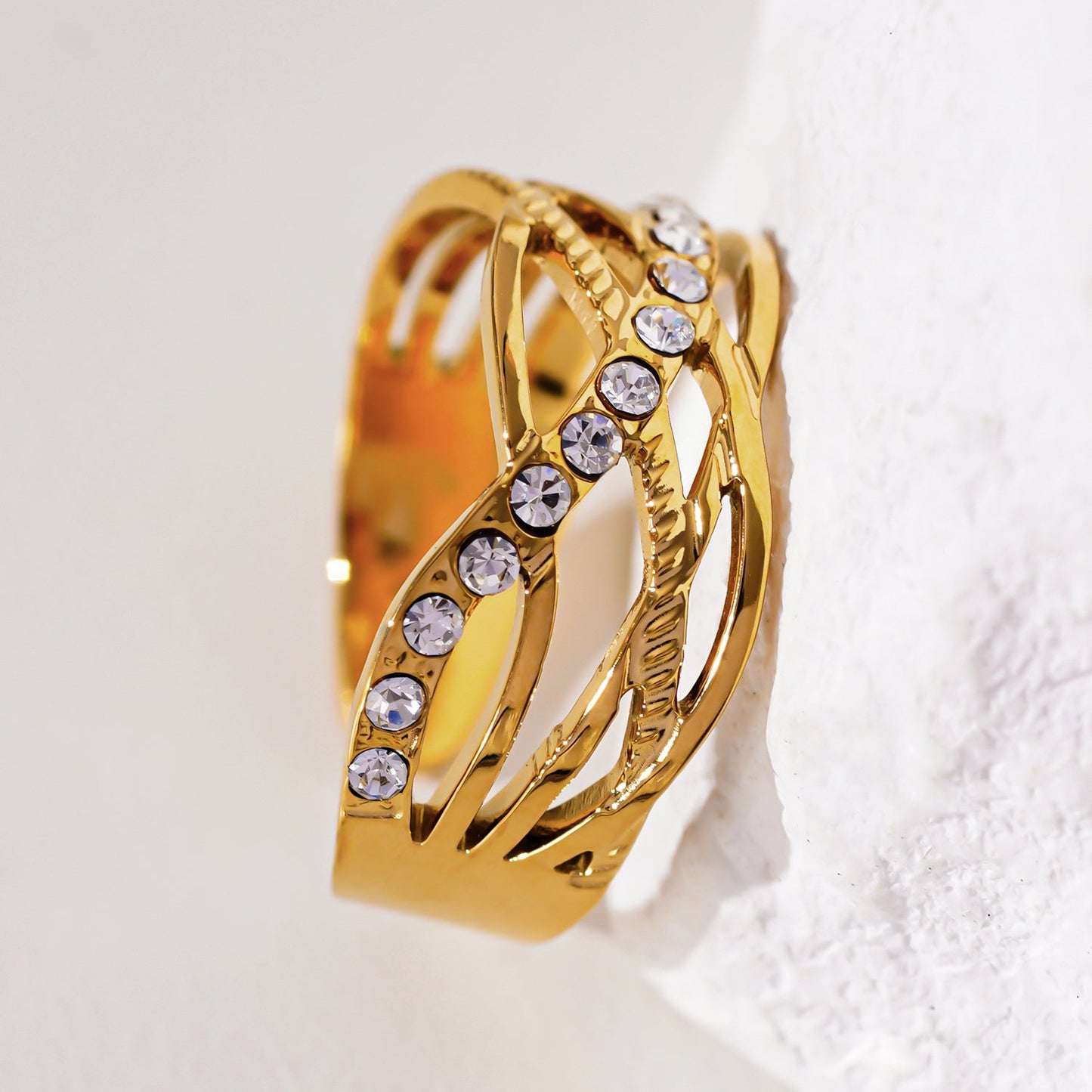 Style CORAZON: Cross Over Multi Stacked Zirconia Embedded Ring