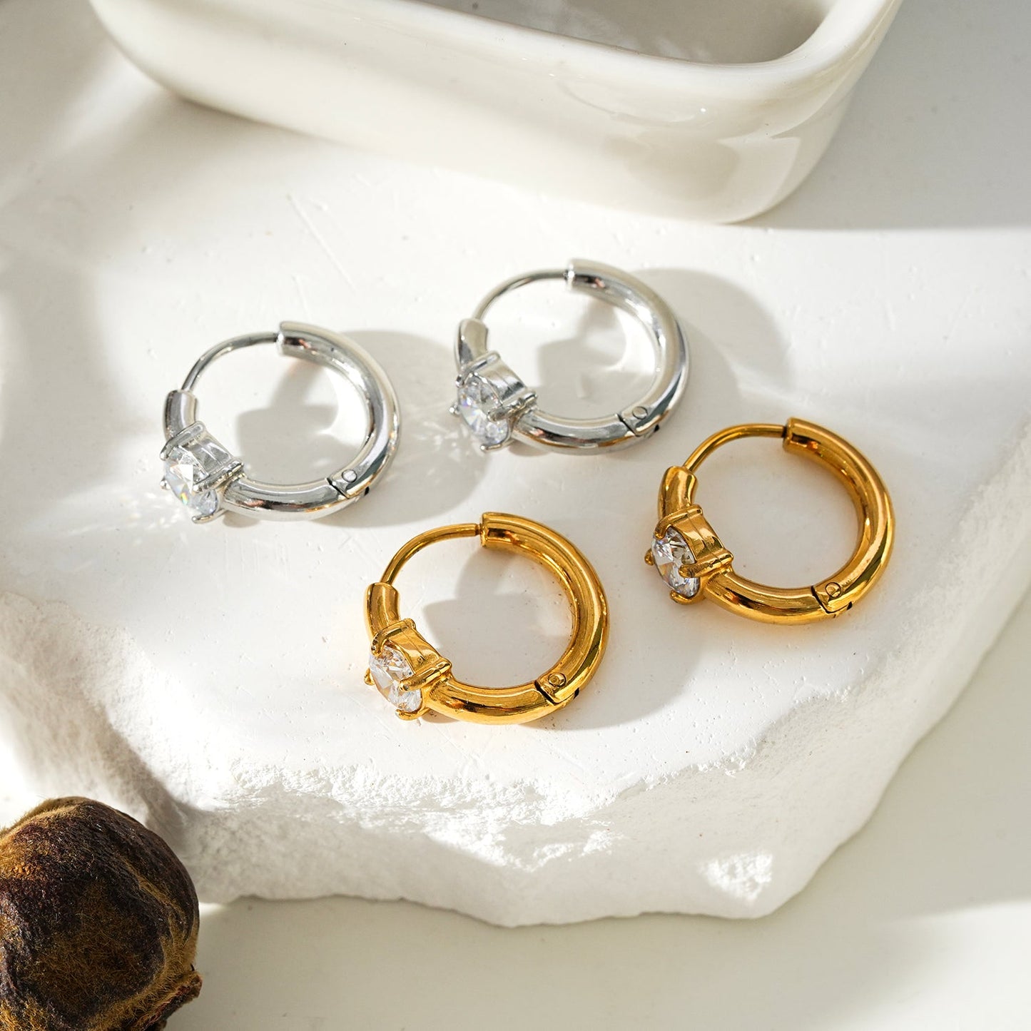 Style GALENA Gold: Mini Hoop Gold Earrings with a Rounded Moissanite Stone