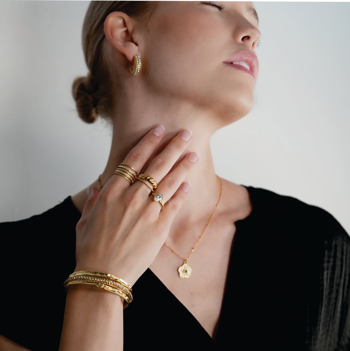 BELLINA Gold: Triple Stacked Textured Bracelet Zirconia (CZ) Embedded Tennis Bracelet at Centre. Stacked for Glamour.