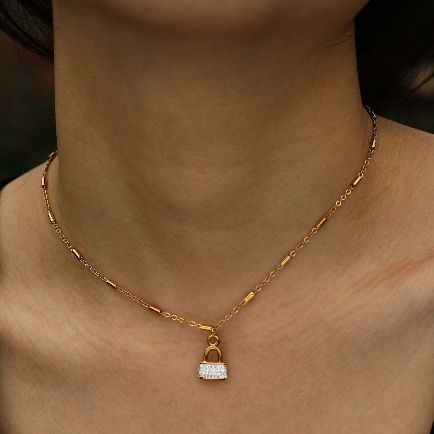 Style ABENI: Pavé Zirconia Pad Lock Pendant on a Tube Bead Chain Necklace in Gold