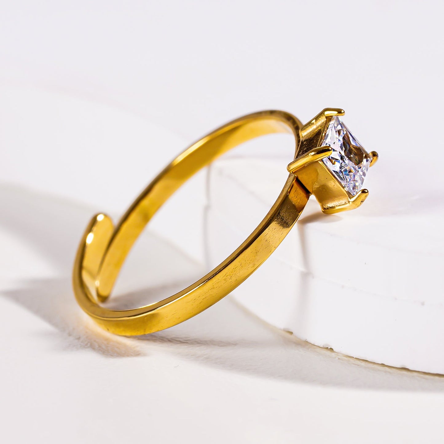 ADHIKA: Classic Gold Ring with a Square Zirconia Centerpiece