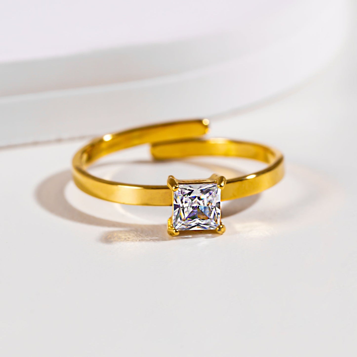 ADHIKA: Classic Gold Ring with a Square Zirconia Centerpiece