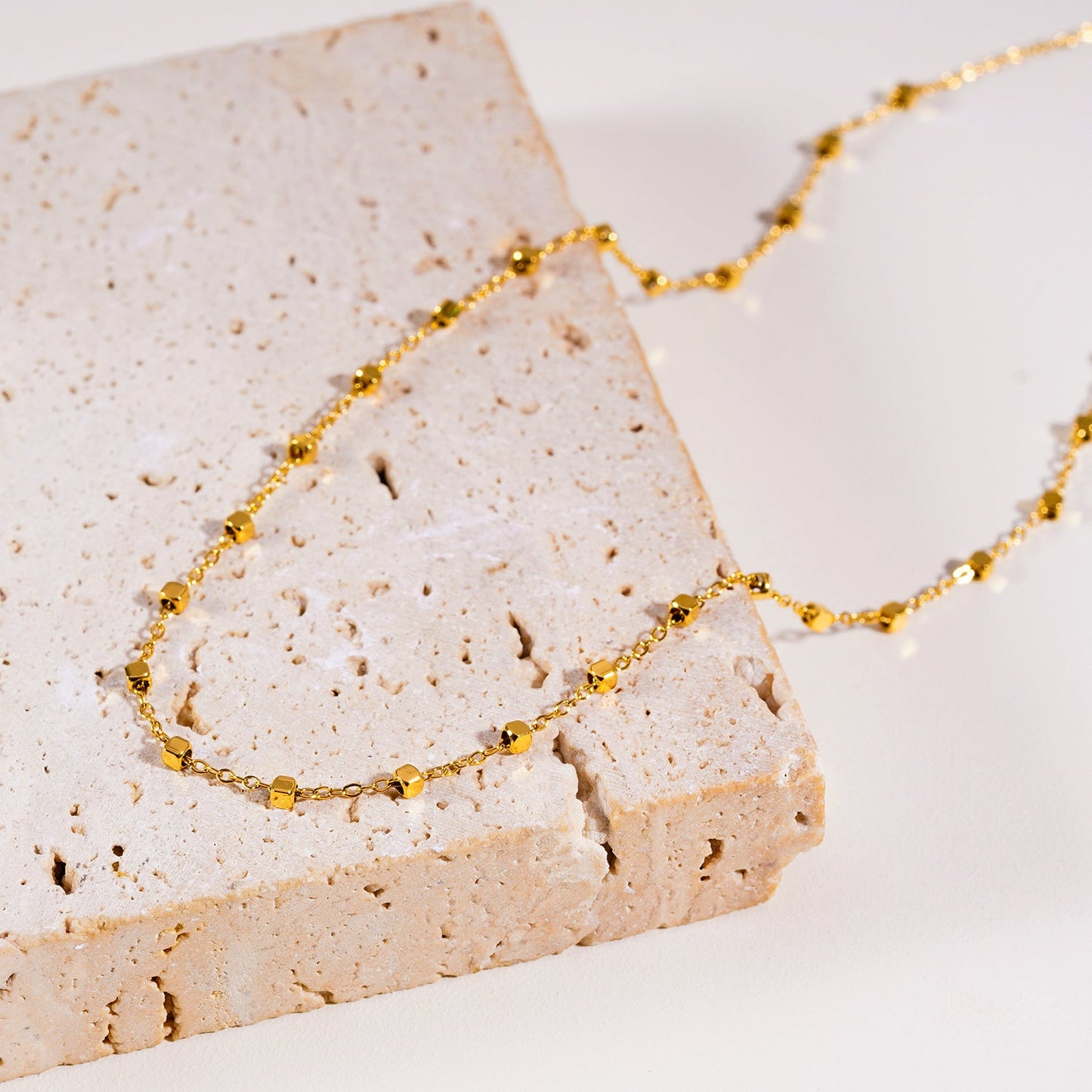 AUREOLE: Essential Daily Chain with Delicate Square Beads in Gold.