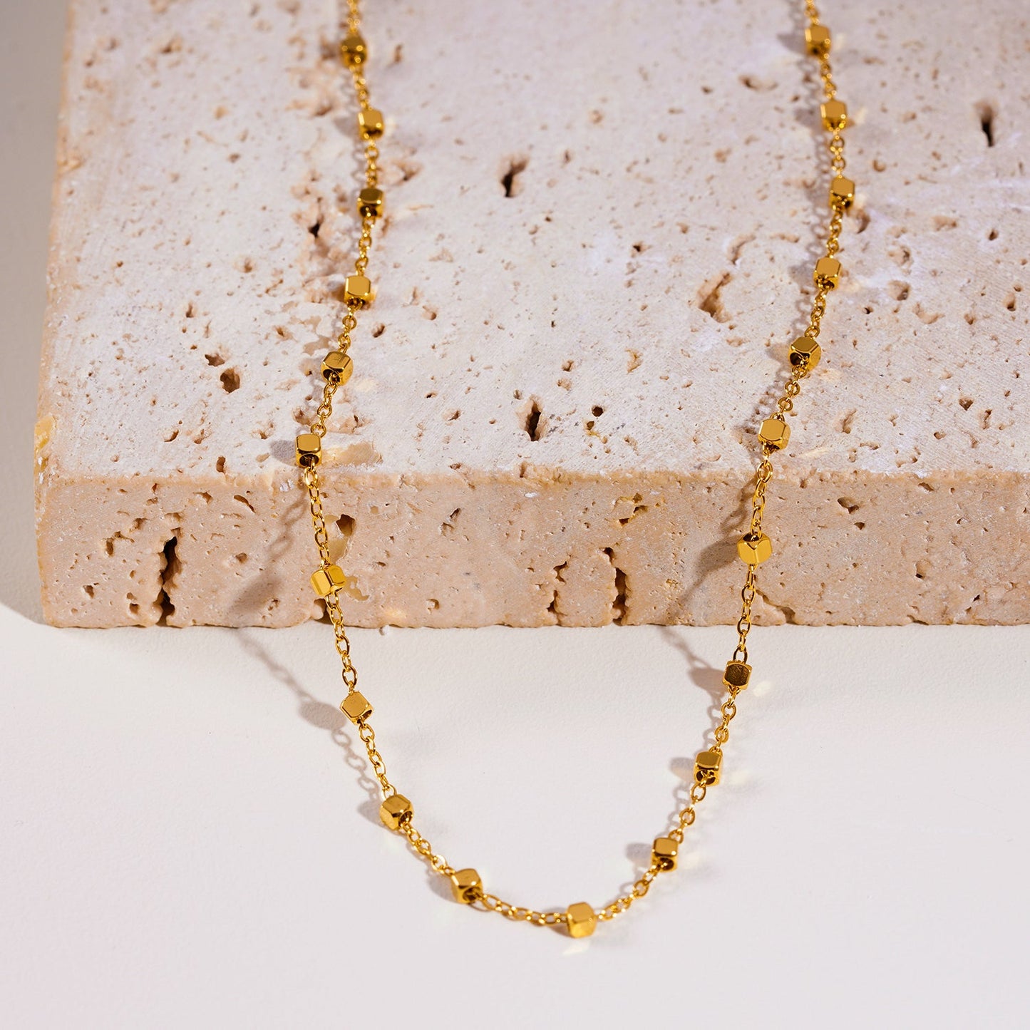 AUREOLE: Essential Daily Chain with Delicate Square Beads in Gold.