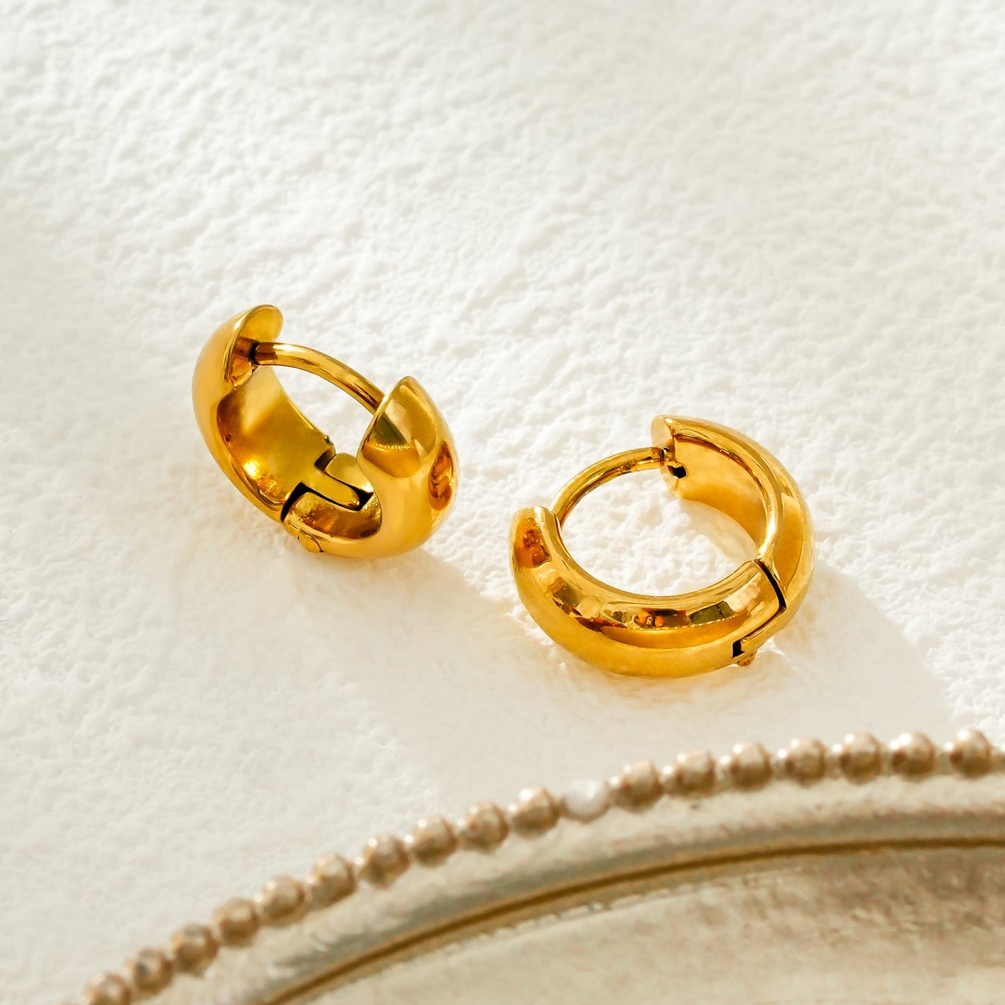 BOCHUM: Barely There, But Beautifully Noticeable Tiny Hoops in Gold