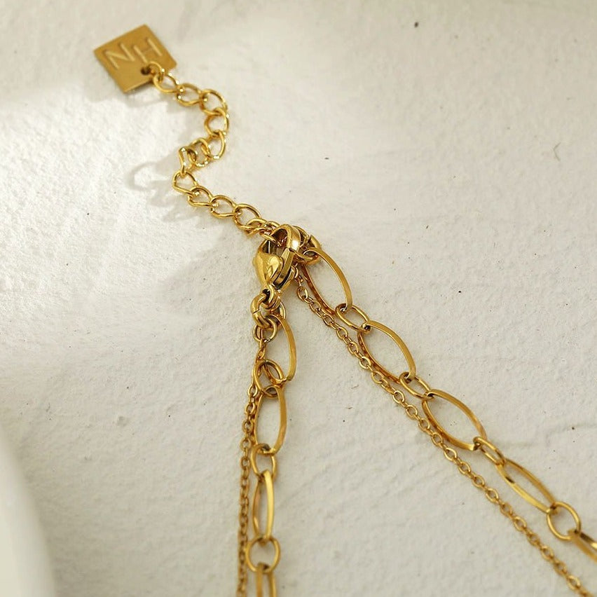 CAMILA: Double Layered Chain Necklace with a Zirconia Embedded Classic Cross Pandent