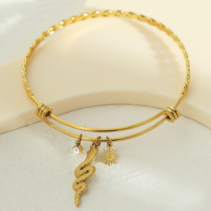 CATALINA Gold: Bracelet with Serpent, Sun Symbol and Zirconia (CZ) Charms