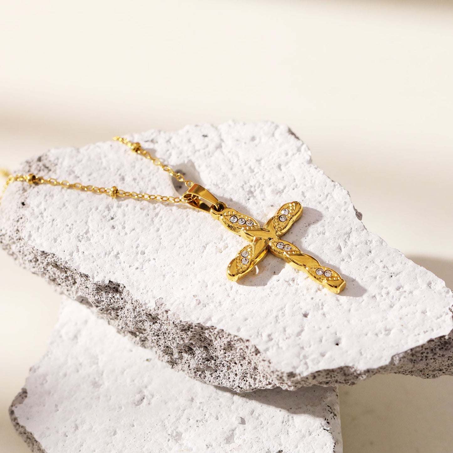 CHAMONIX Gold: Dainty Beaded Chain Necklace with a Zirconia Embedded Textured Cross Pandent