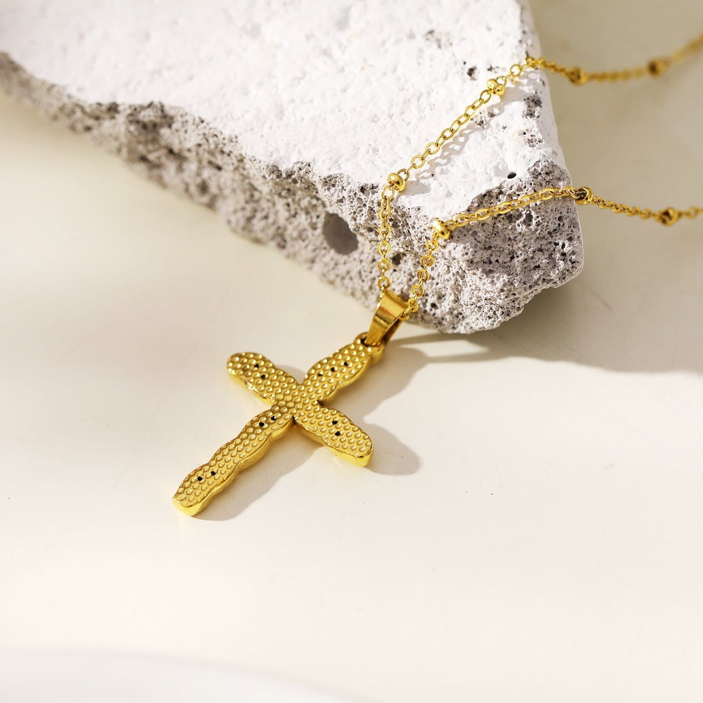 CHAMONIX Gold: Dainty Beaded Chain Necklace with a Zirconia Embedded Textured Cross Pandent