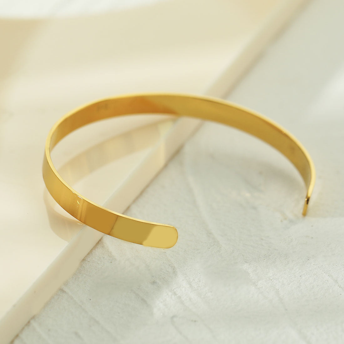 CHIMAKAK: Star-Engraved Zirconia Embedded Band Bracelet in Gold