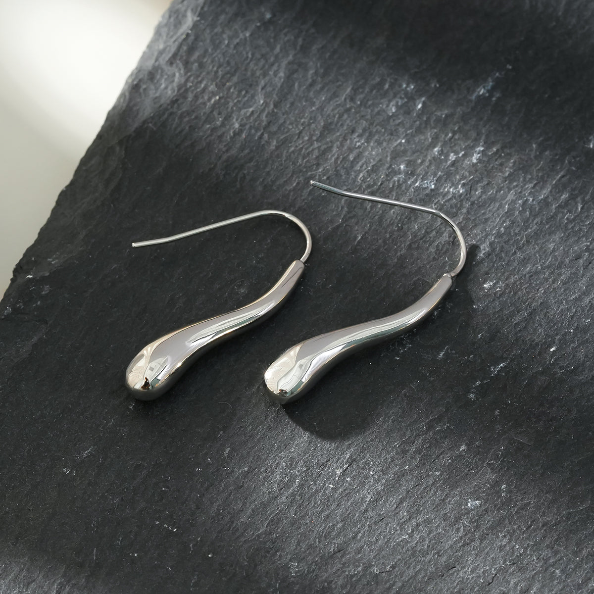 Style CORNING Silver (White Gold): Tadpole-Shaped Earrings – Unique Elegance with a Playful Twist