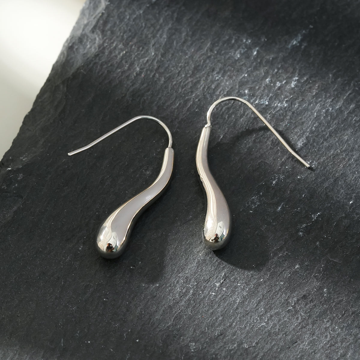Style CORNING Silver (White Gold): Tadpole-Shaped Earrings – Unique Elegance with a Playful Twist