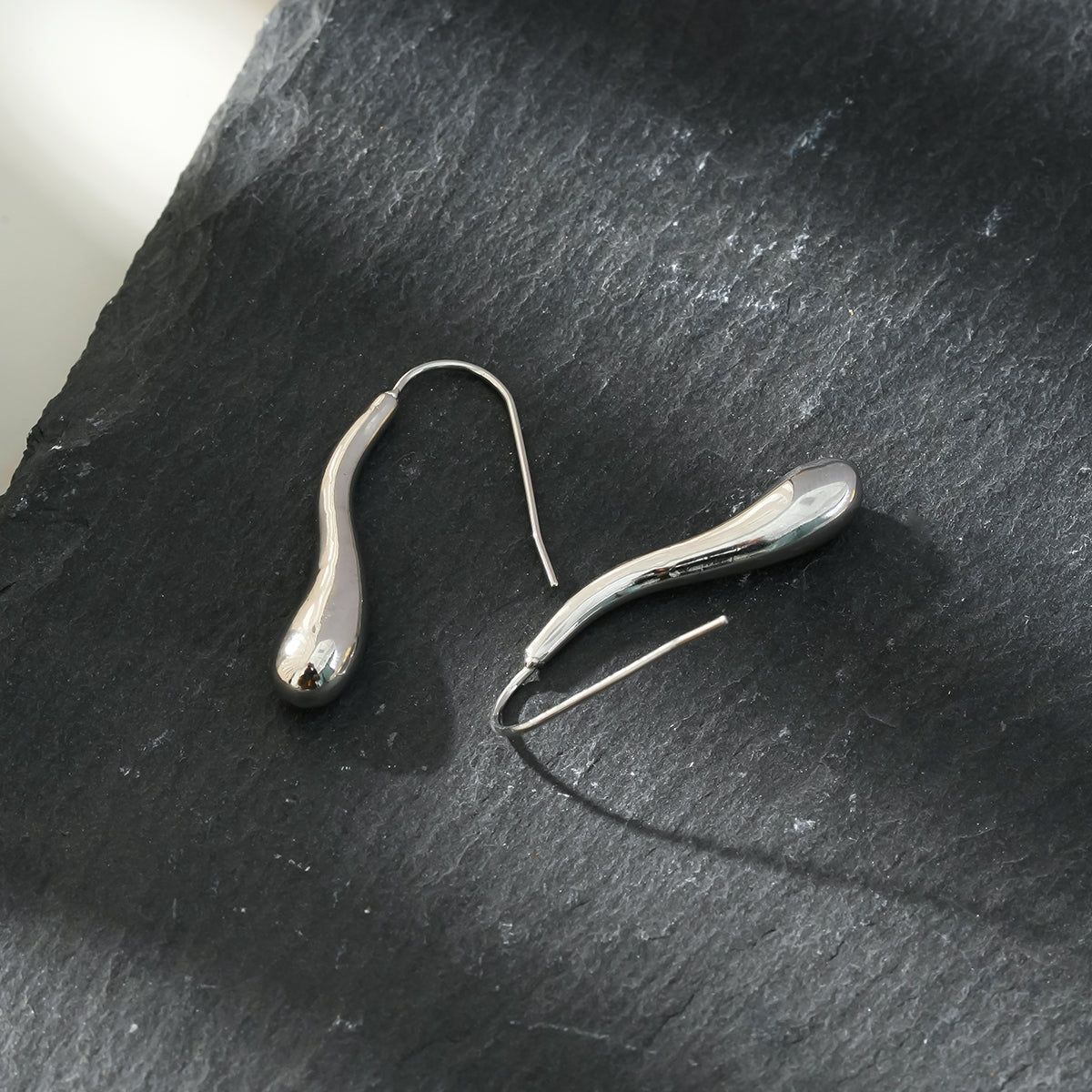 Style CORNING Silver (White Gold): Tadpole-Shaped Earrings – Unique Elegance with a Playful Twist