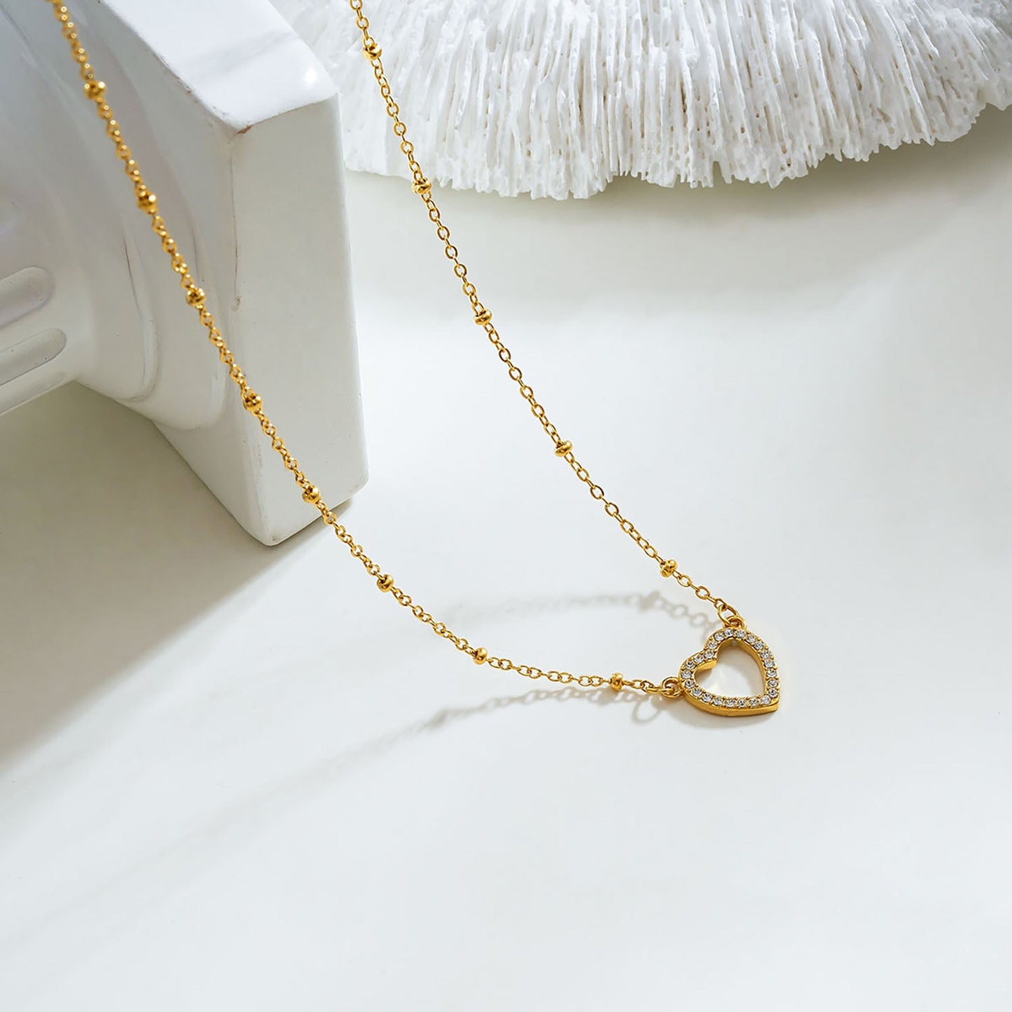 Style CHERISH Gold: Beaded Chain Anchoring an Elegant Pavé Heart Charm Pendant