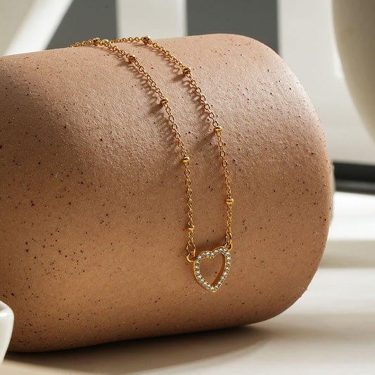 Style CHERISH Gold: Beaded Chain Anchoring an Elegant Pavé Heart Charm Pendant