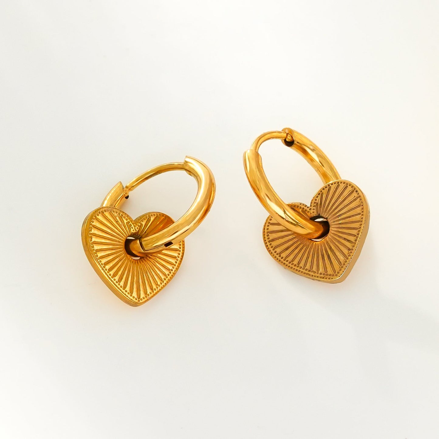 ENDEAR Gold: Romantic Heart Charm Hoop Earrings – A Symbol of Everlasting Love.