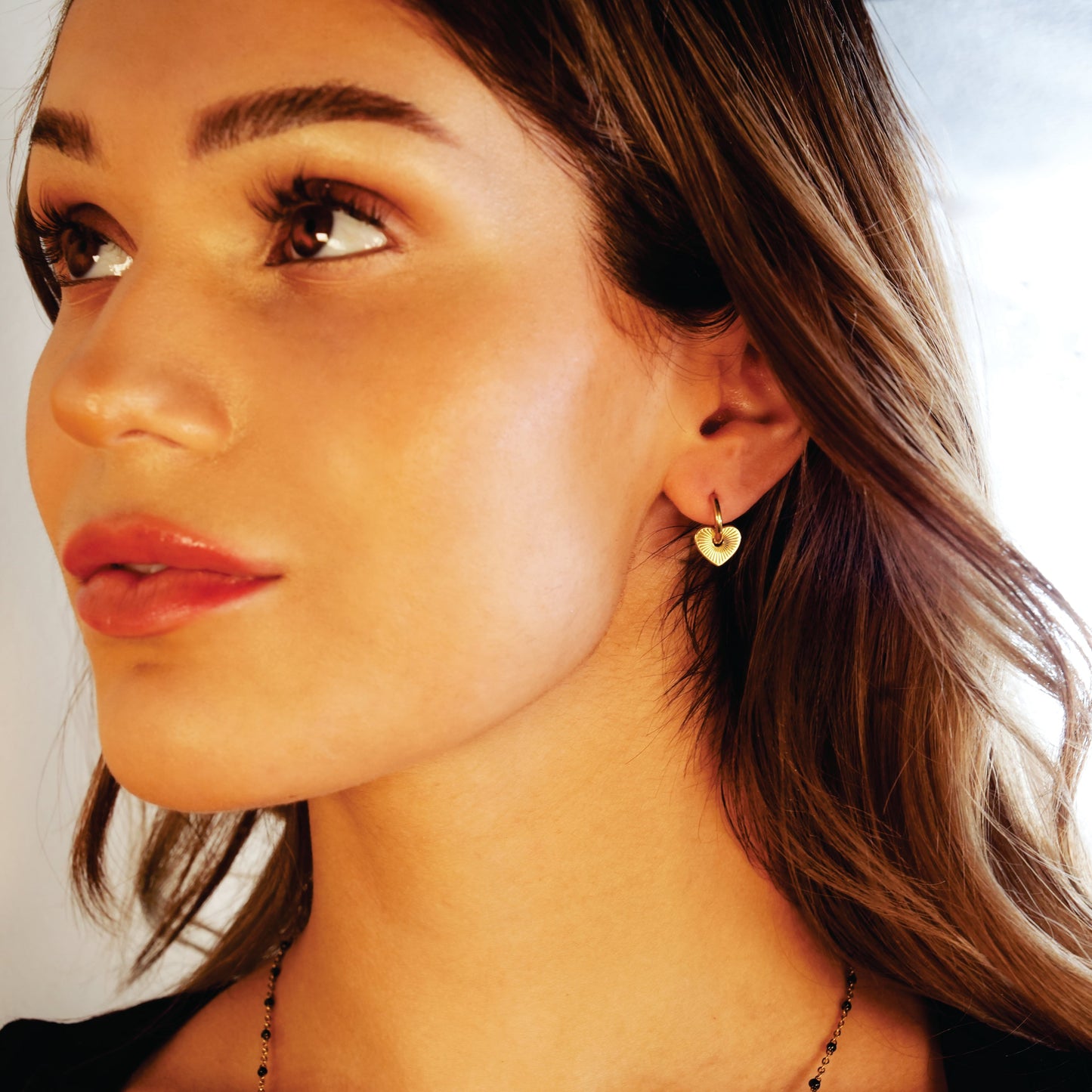 ENDEAR Gold: Romantic Heart Charm Hoop Earrings – A Symbol of Everlasting Love.