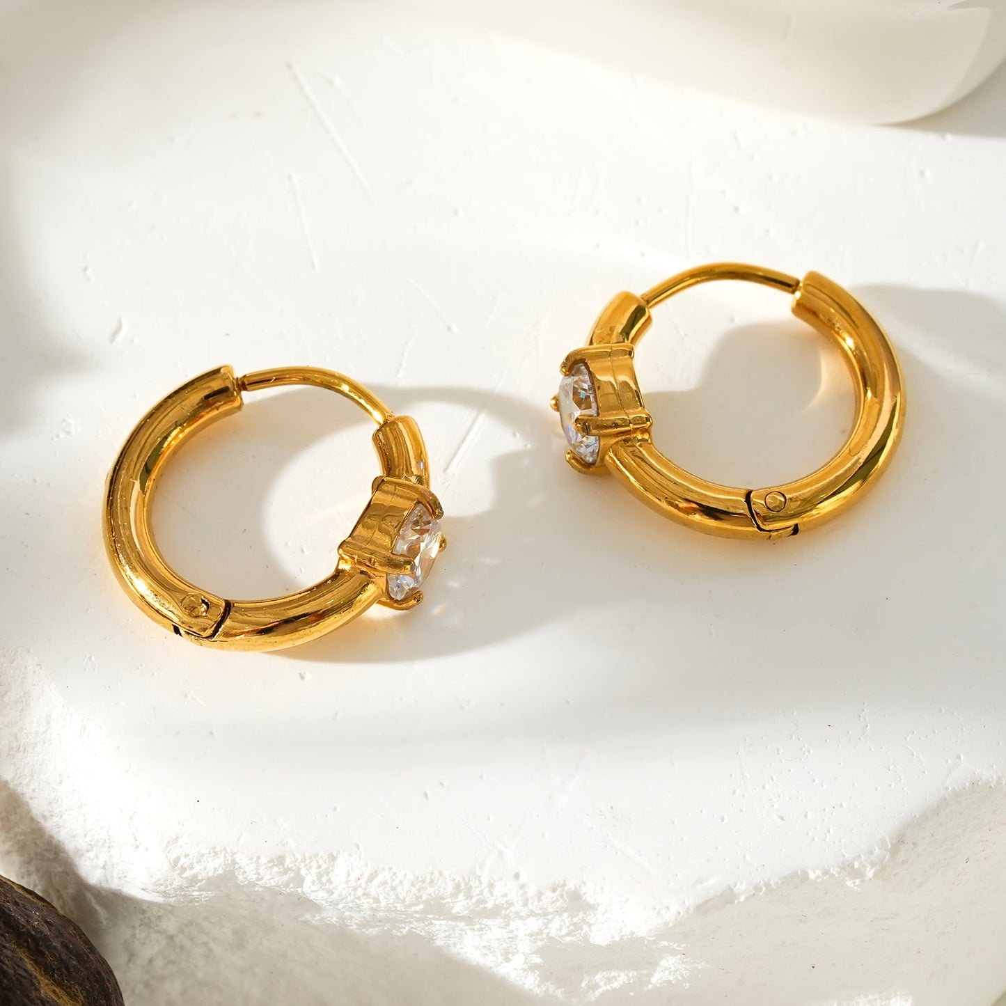 Style GALENA Gold: Mini Hoop Gold Earrings with a Rounded Moissanite Stone