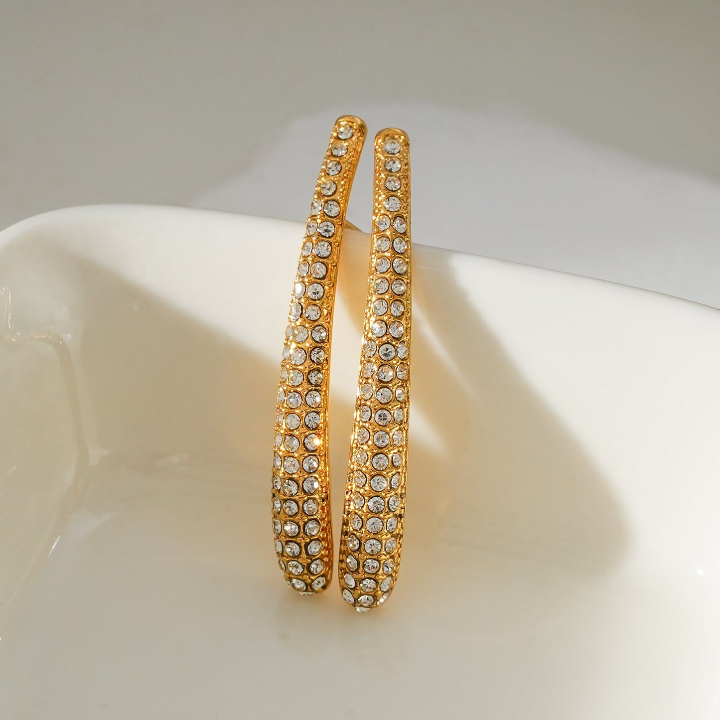 Style HILO: Curved Pavé Zirconia Shaped Stud Earrings in Gold
