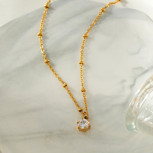 KADIRI Gold:  Solitaire Zirconia Charm Pendant on a Beaded Chain Necklace