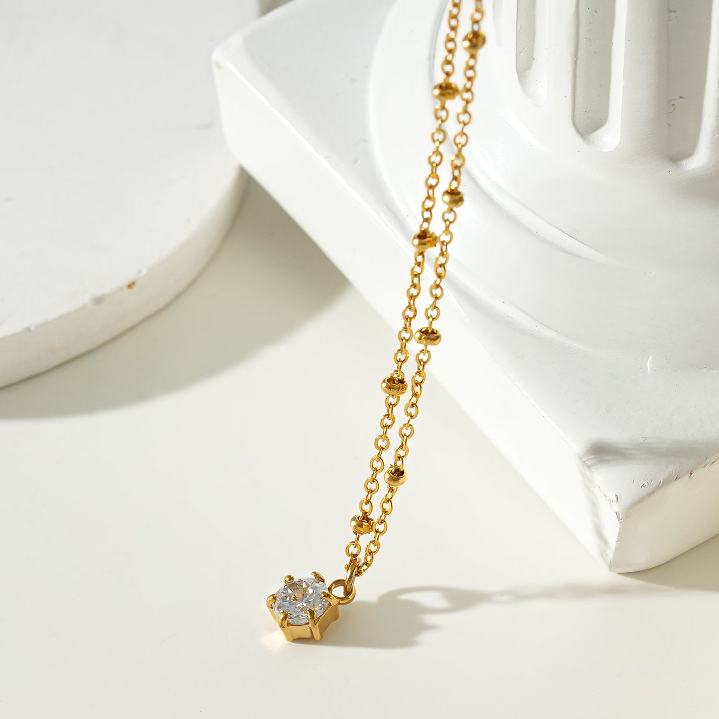 KADIRI Gold:  Solitaire Zirconia Charm Pendant on a Beaded Chain Necklace