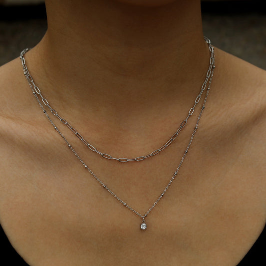 KATERI Silver: Pre-Layered Chains Necklace with a Solitaire Zirconia Charm Pendant