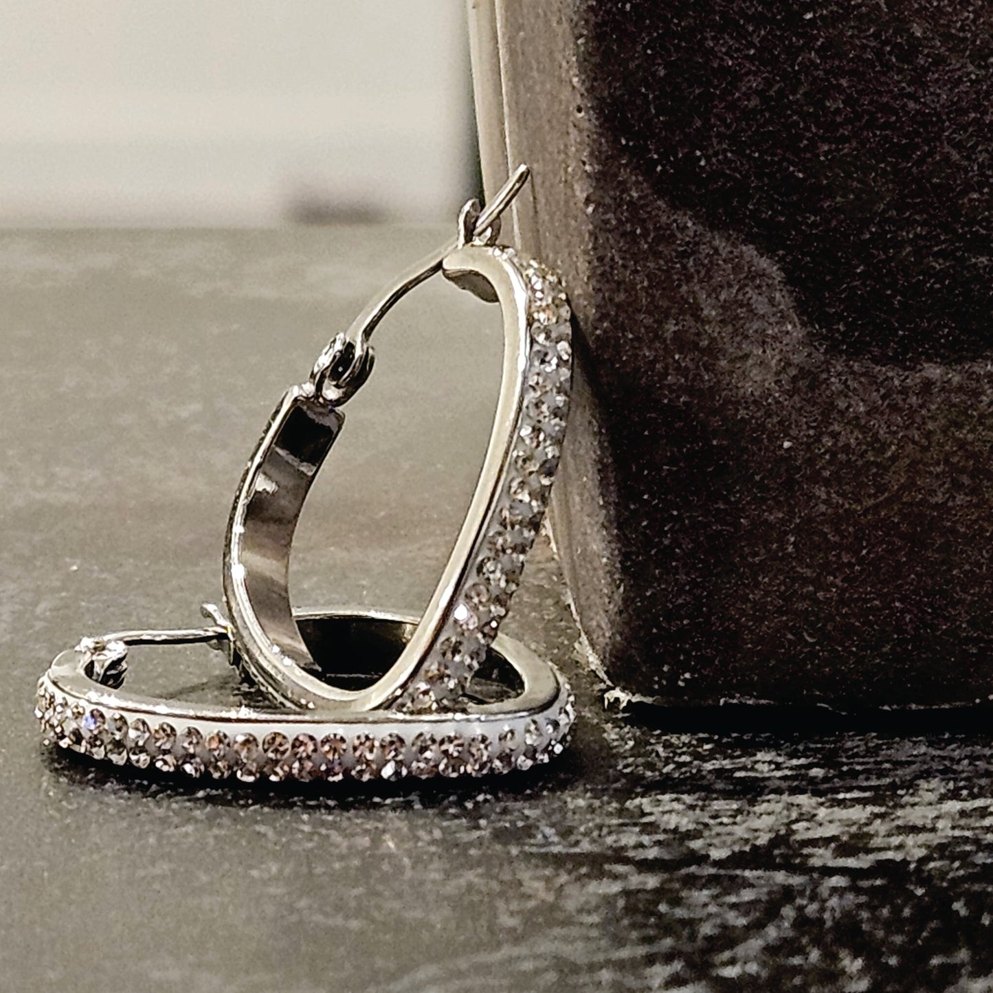 Style MELFI Silver: Abstract Heart Shaped Hoops embedded with Zirconia Gemstones