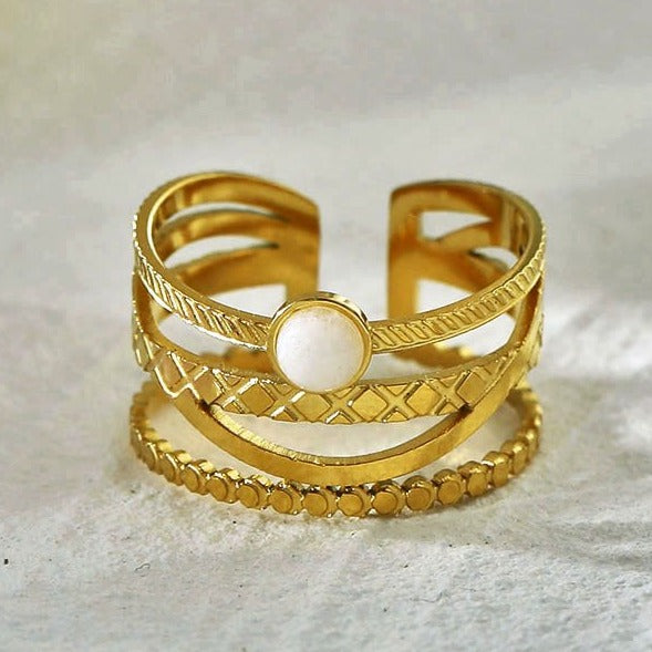 NADIA Gold: Multi Stacked Ring with a Stone Centre Piece