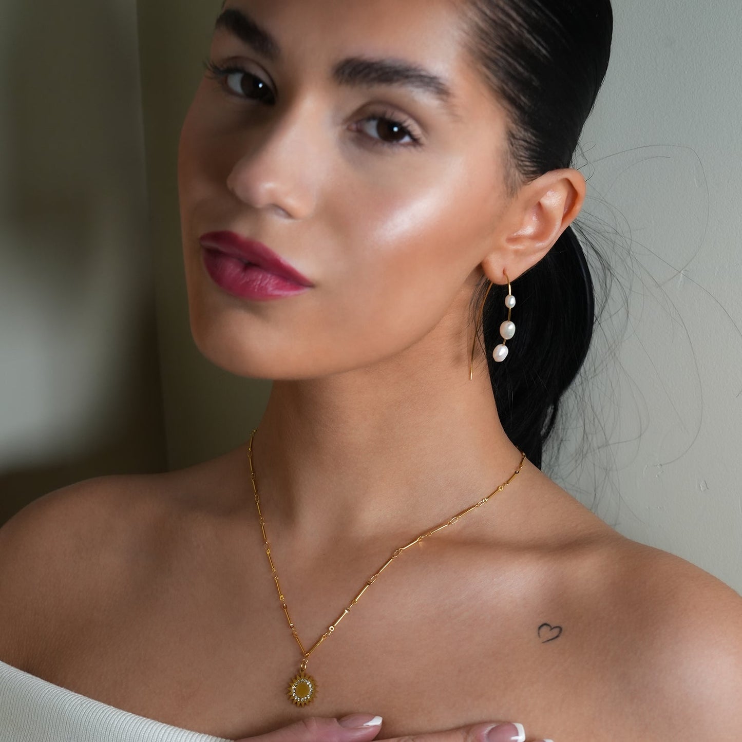 NOMIA Gold: Radiant Sunburst Pendant Zirconia Chain Necklace