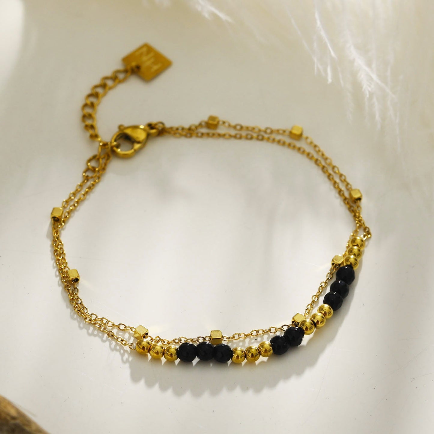 HILDA: Two-in-One Square Beads & Round Beads in Black & Gold Bracelet.