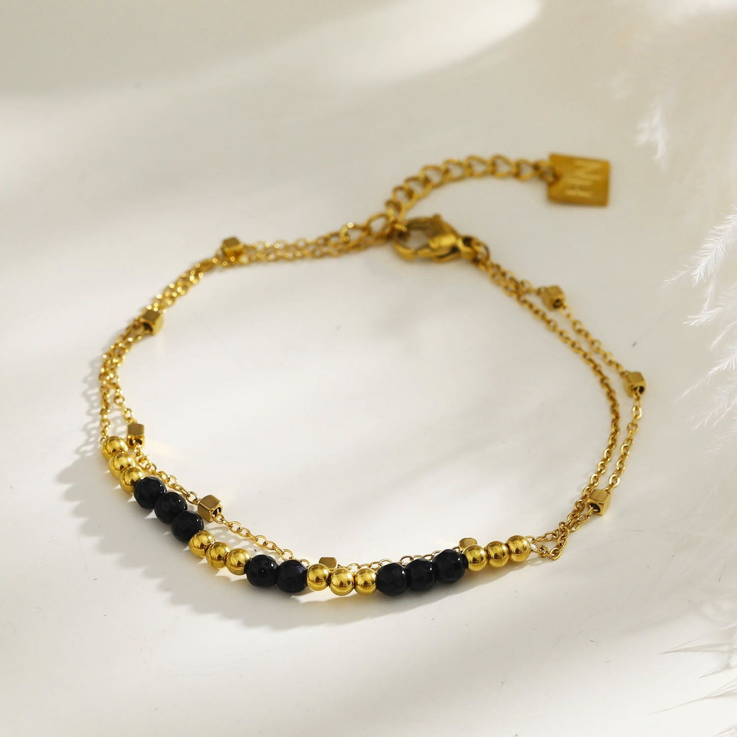 HILDA: Two-in-One Square Beads & Round Beads in Black & Gold Bracelet.