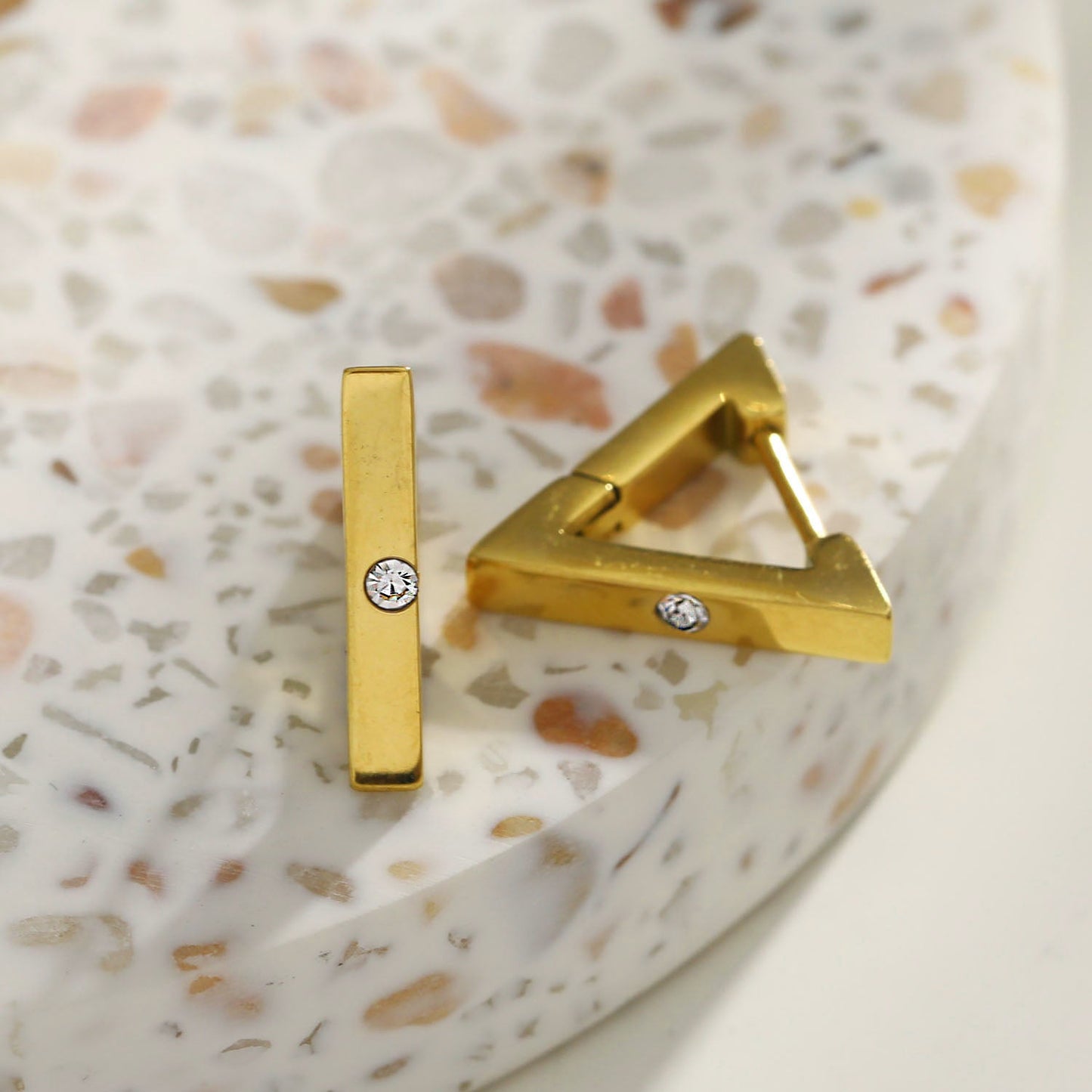 AMIRA: Triangle Shaped Mini Hoop Earrings with Solitaire Zirconia.