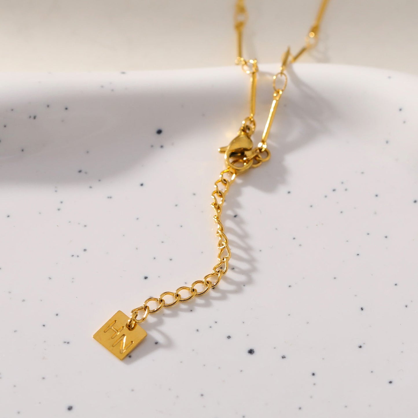 NOMIA Gold: Radiant Sunburst Pendant Zirconia Chain Necklace
