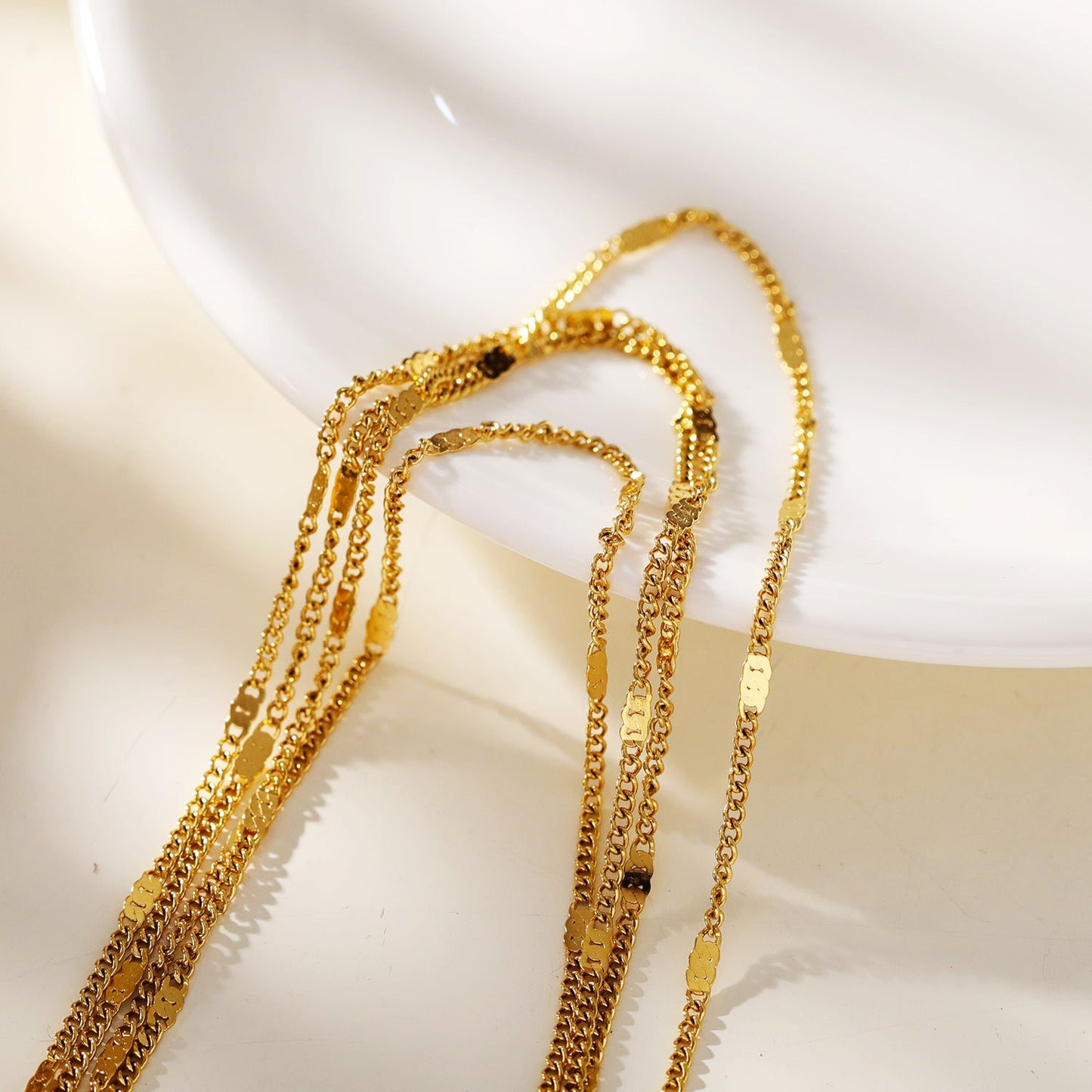 MORIA: Layered Luxe 4-Strand Chain Necklace