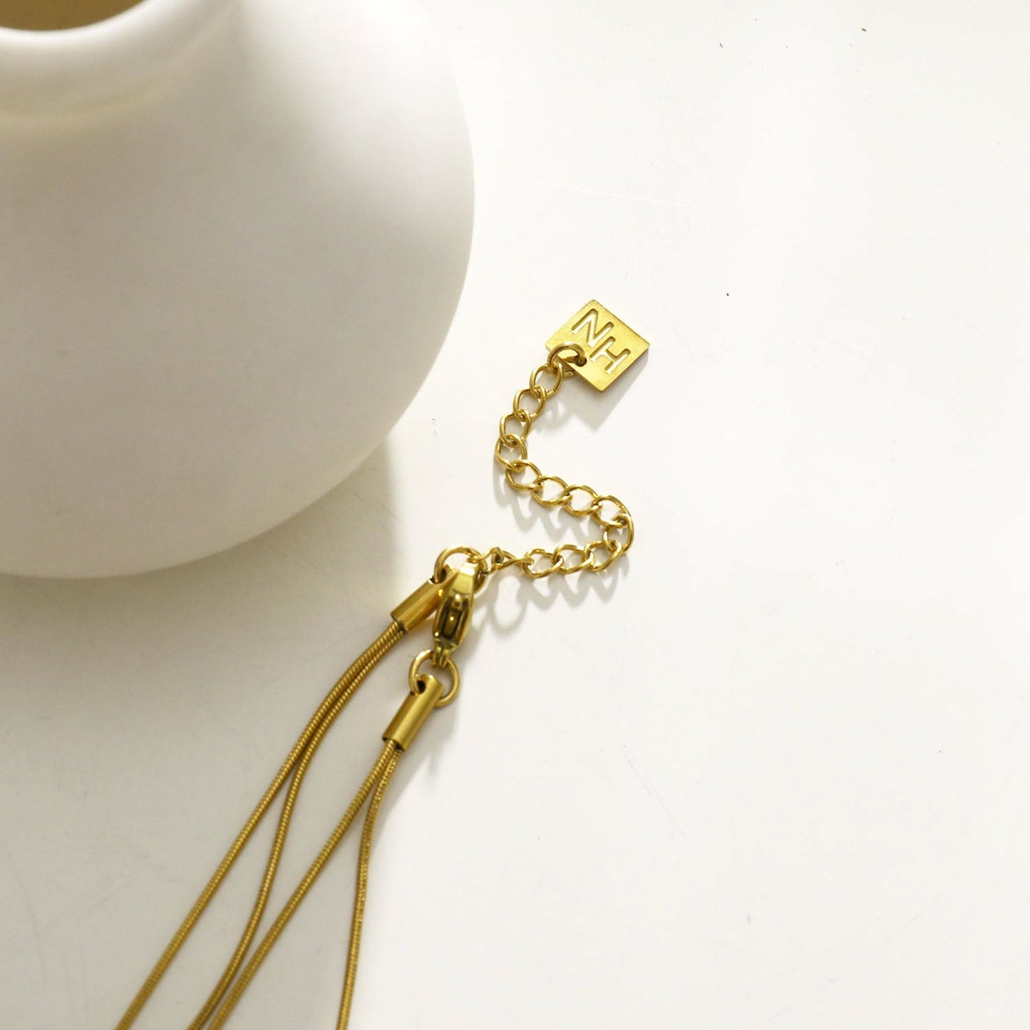 TELMA: Lariat Style Multi Stranded Necklace.