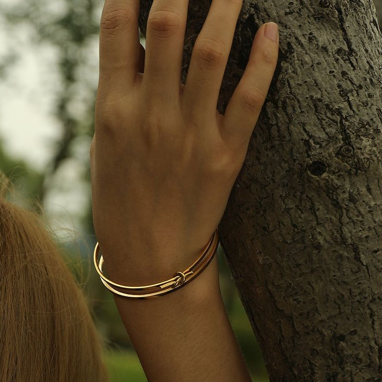TIED: Knot Detailed Stacked Bracelet in Gold