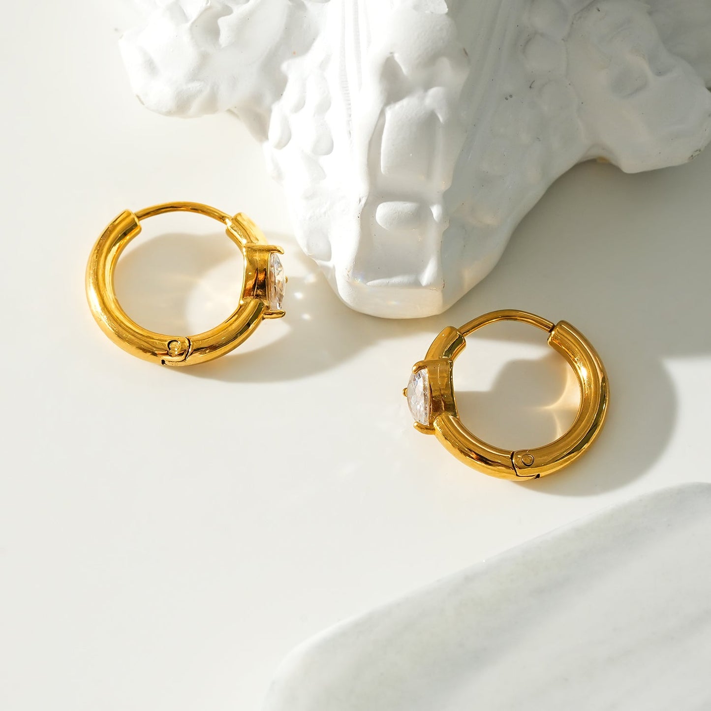 Style PELLA Gold: Mini Hoop Gold Earrings with Heart Shaped Moissanite