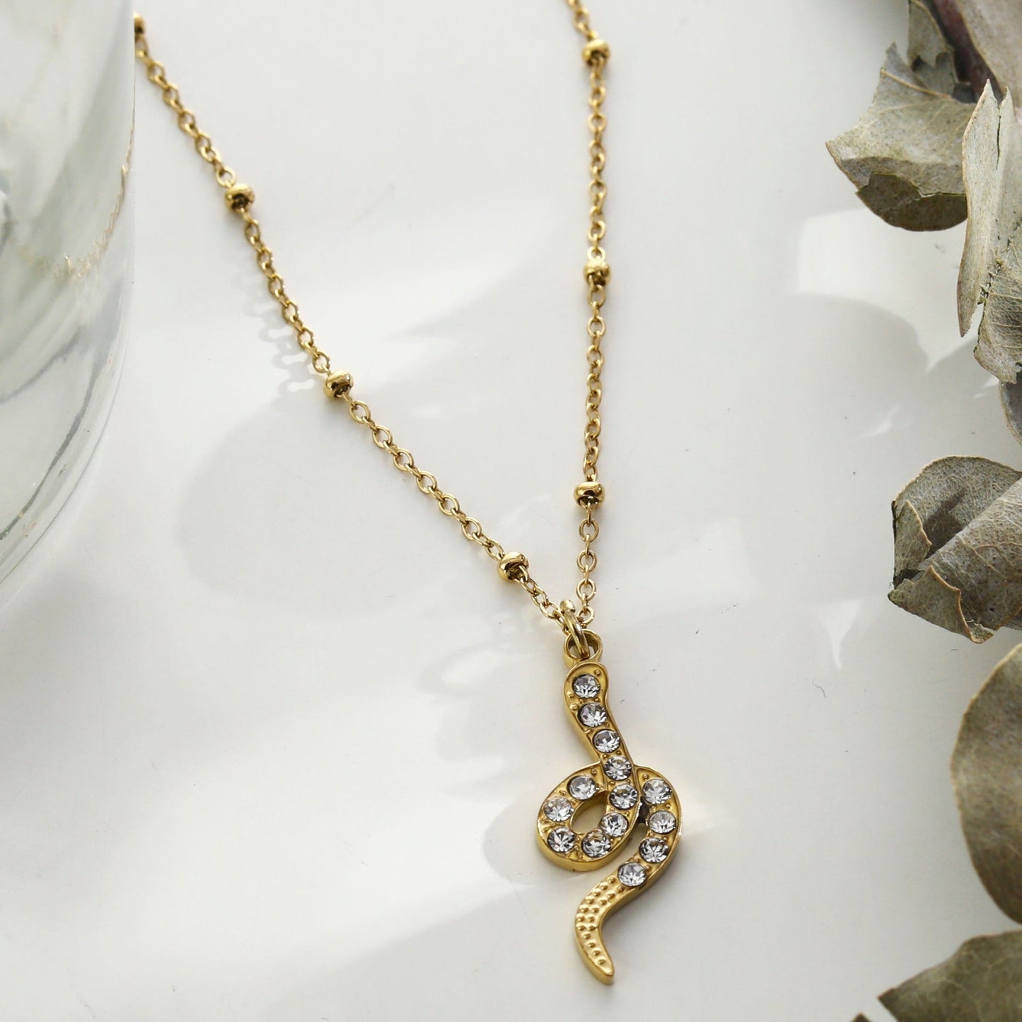 RIHANNA Beaded Chain Necklace with a Pavé Zirconia Serpent Pendant in Gold