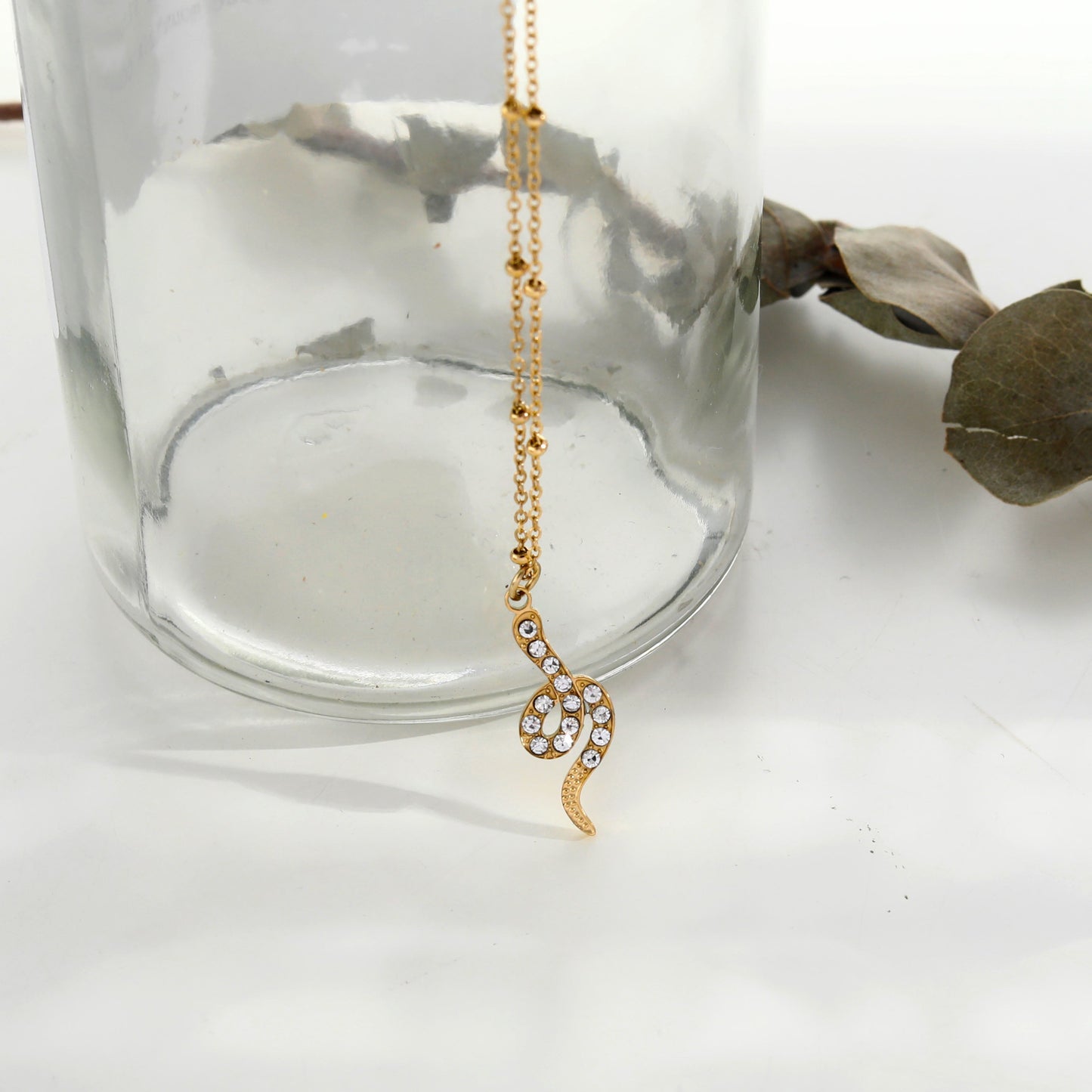 RIHANNA Beaded Chain Necklace with a Pavé Zirconia Serpent Pendant in Gold