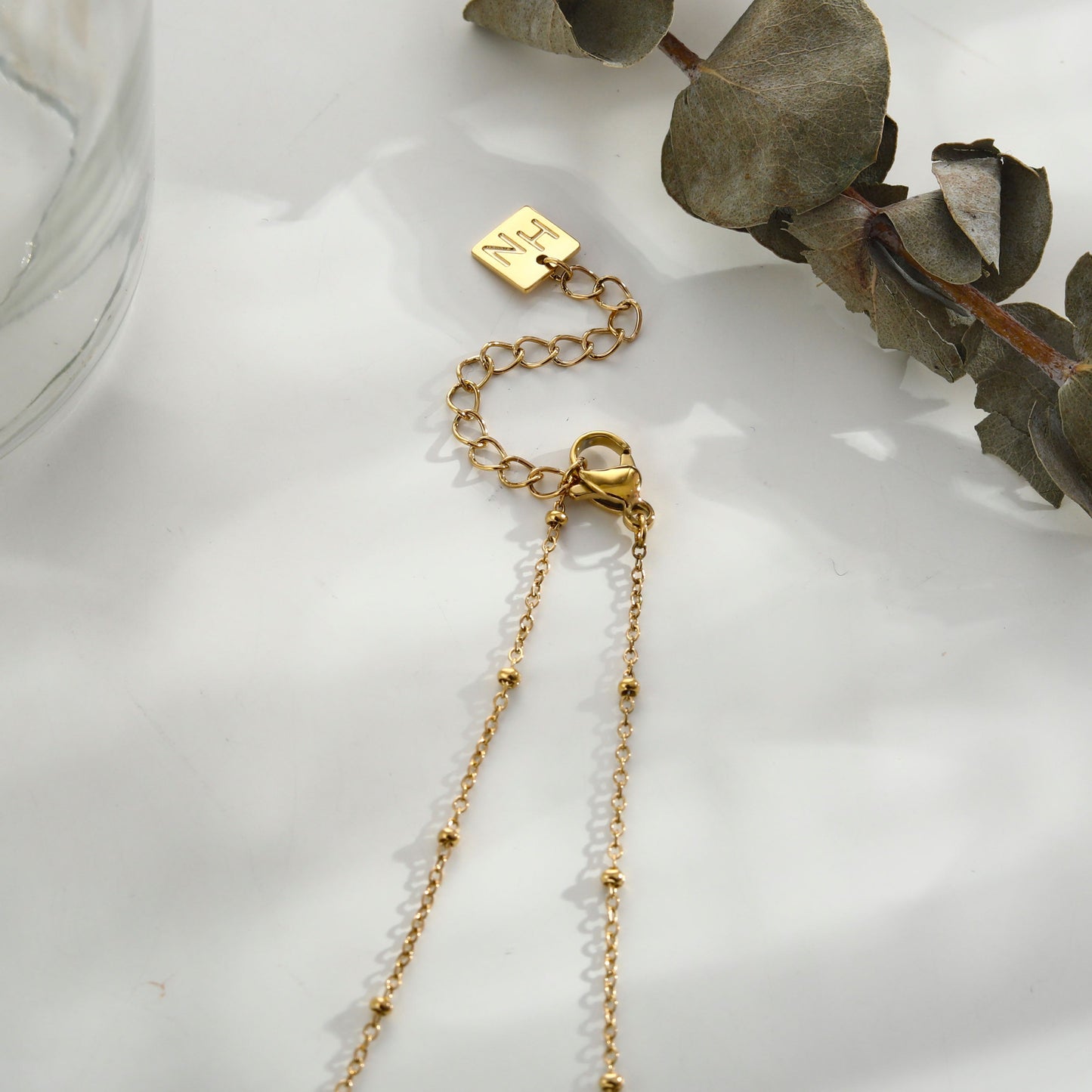 RIHANNA Beaded Chain Necklace with a Pavé Zirconia Serpent Pendant in Gold
