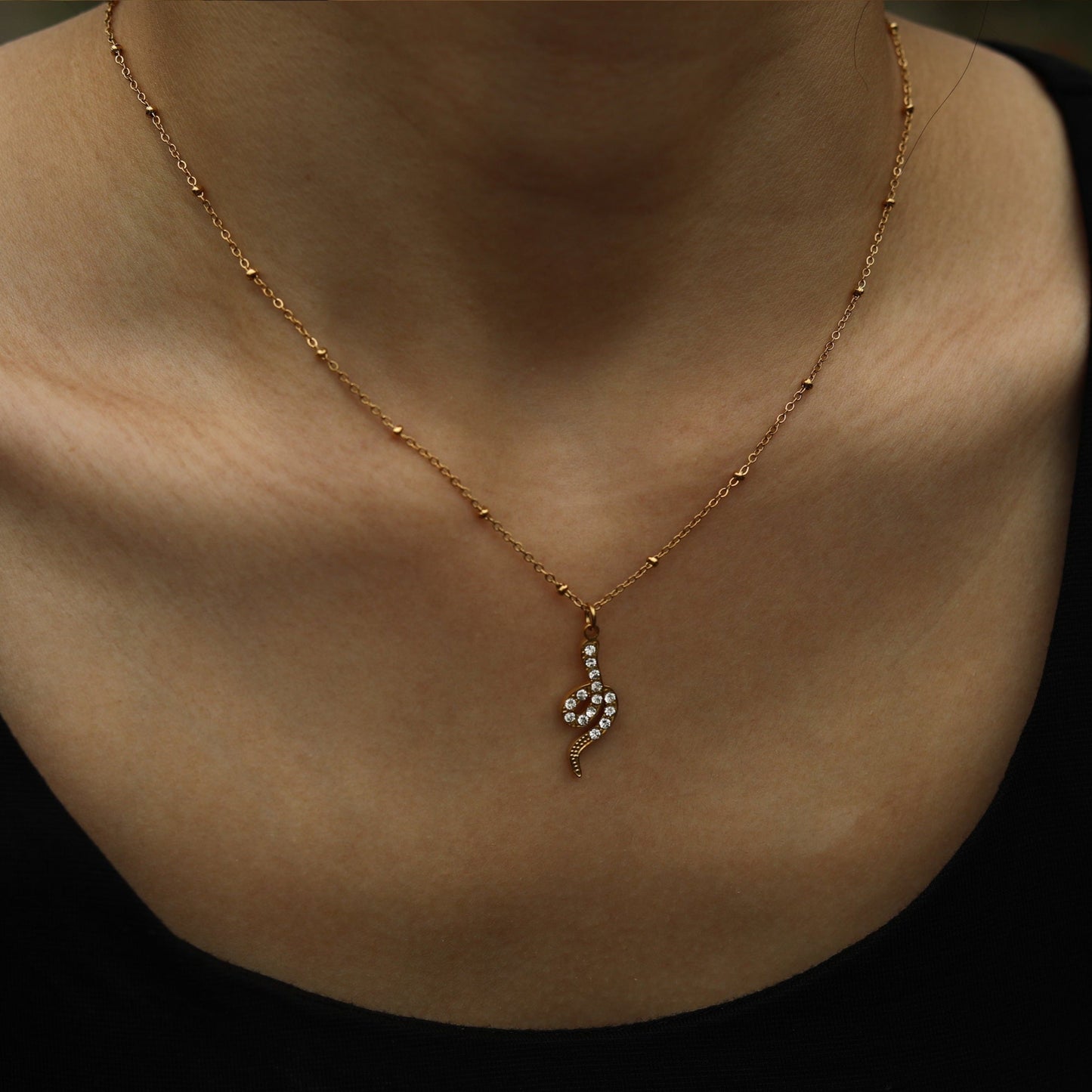 RIHANNA Beaded Chain Necklace with a Pavé Zirconia Serpent Pendant in Gold