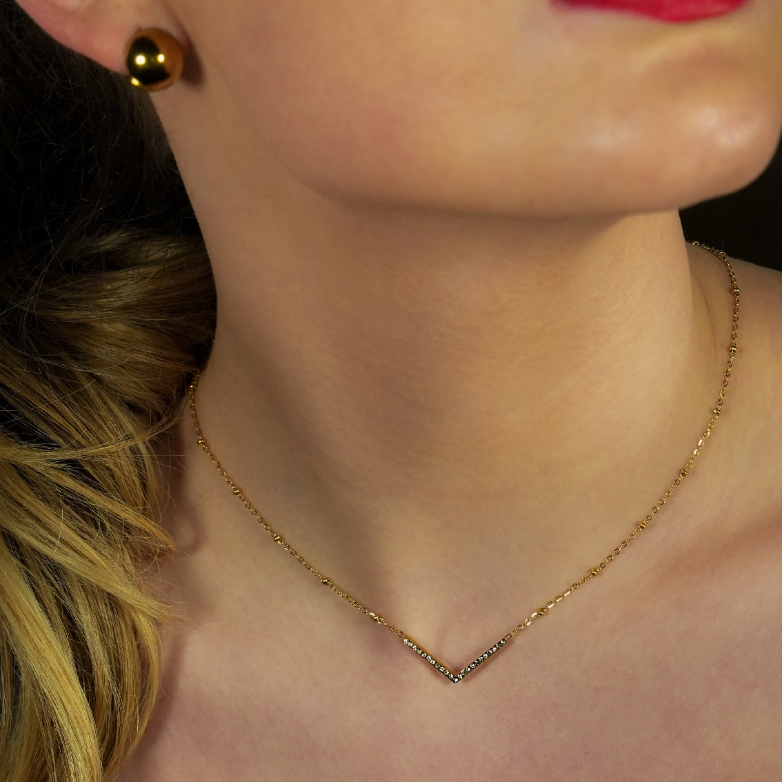 SANITA: Beaded Dainty Chain Anchoring 'V' Shaped Zirconia Embedded Pendant Charm