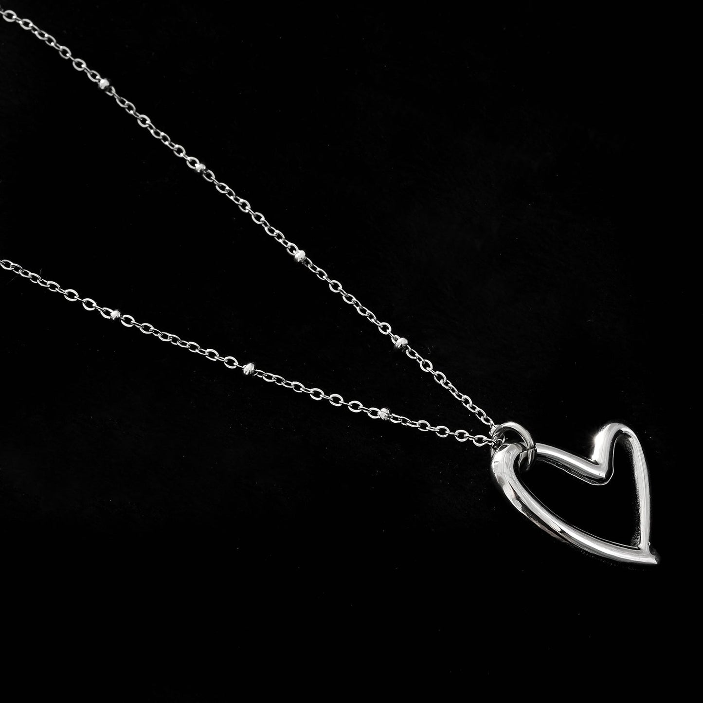 SMITTEN Silver (White Gold): Dainty Beaded Chain Anchoring an Abstract Heart Shaped Pendant