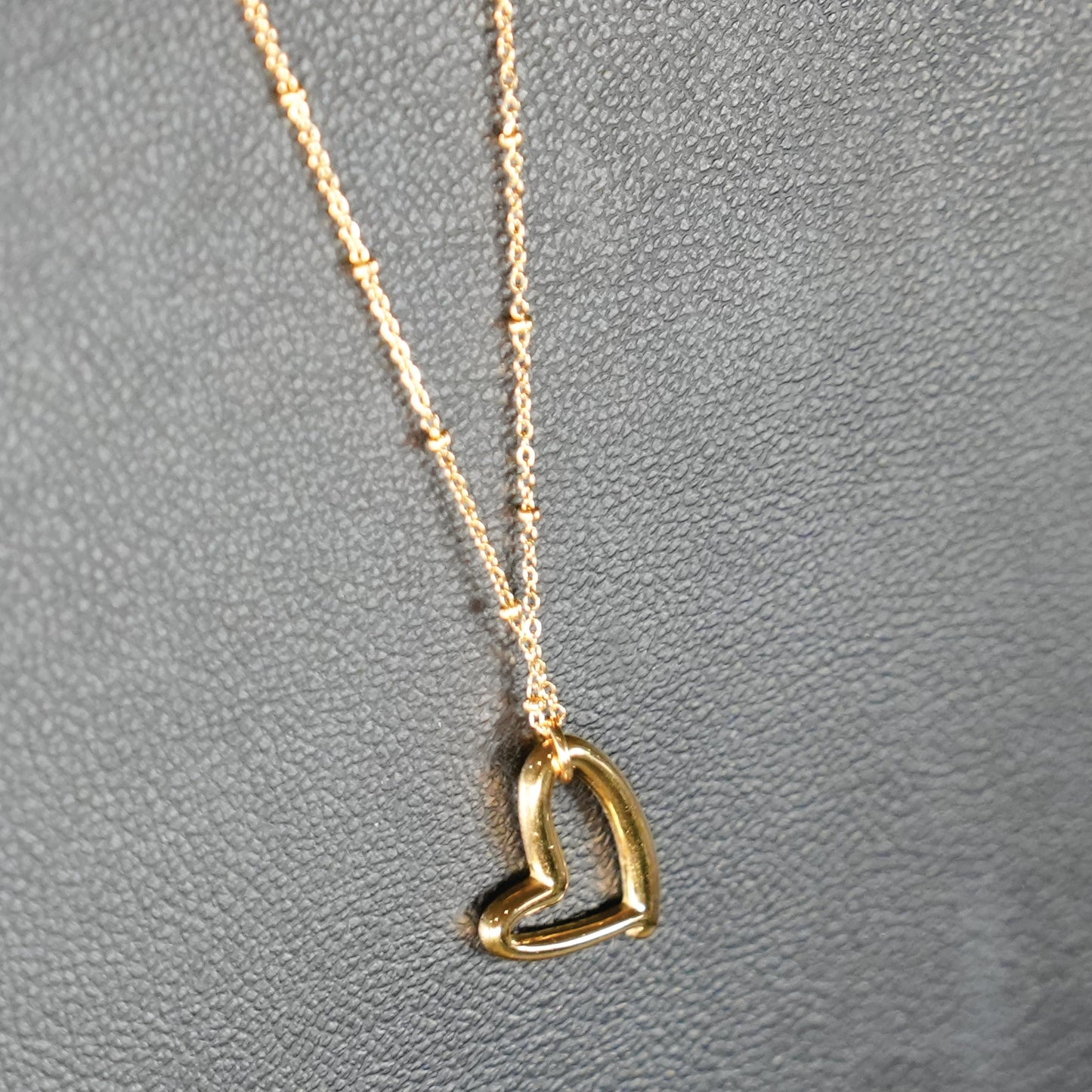 SMITTEN Gold: Dainty Beaded Chain Anchoring an Abstract Heart Shaped Pendant