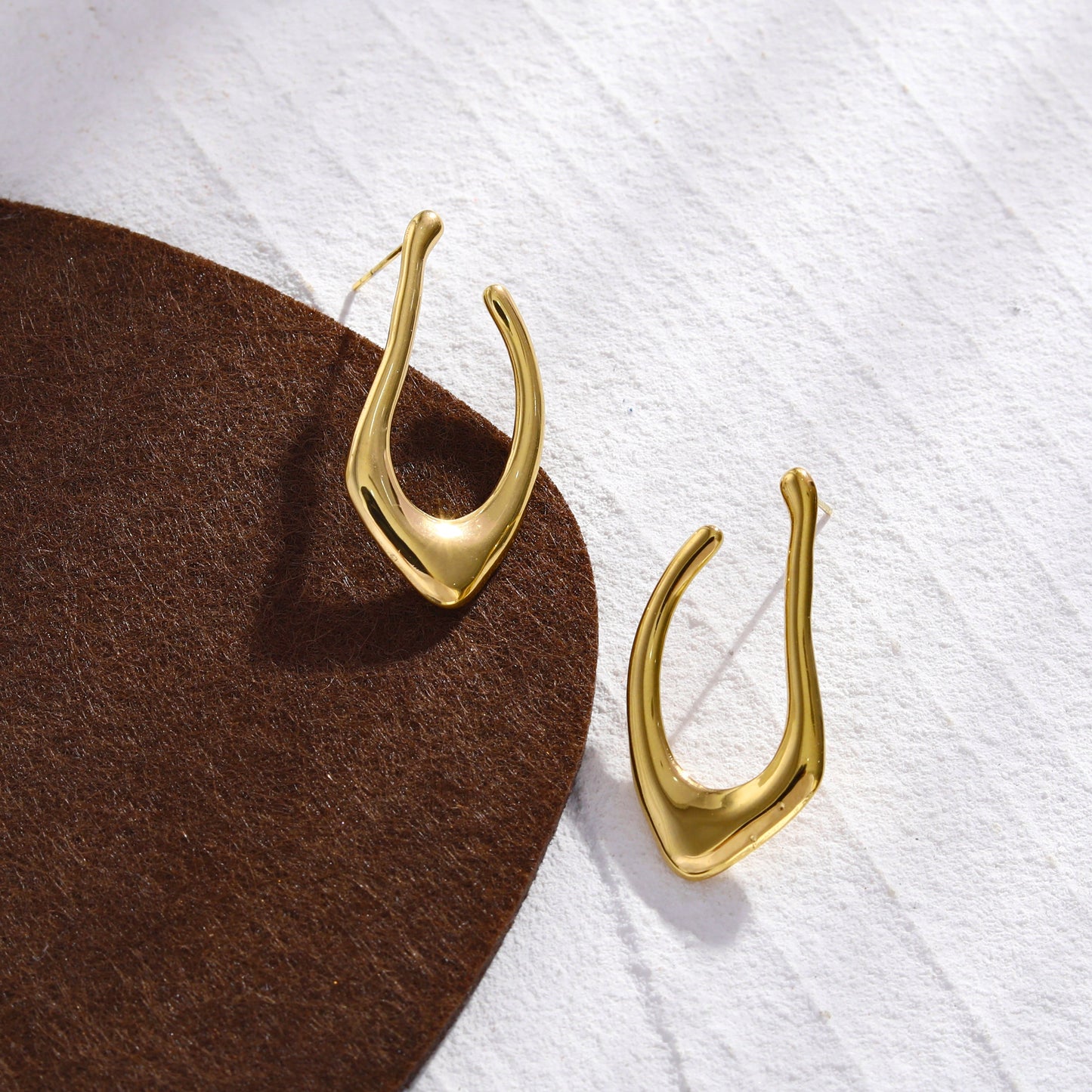 TARAJI Abstract Shaped Hoop Earrings in Gold
