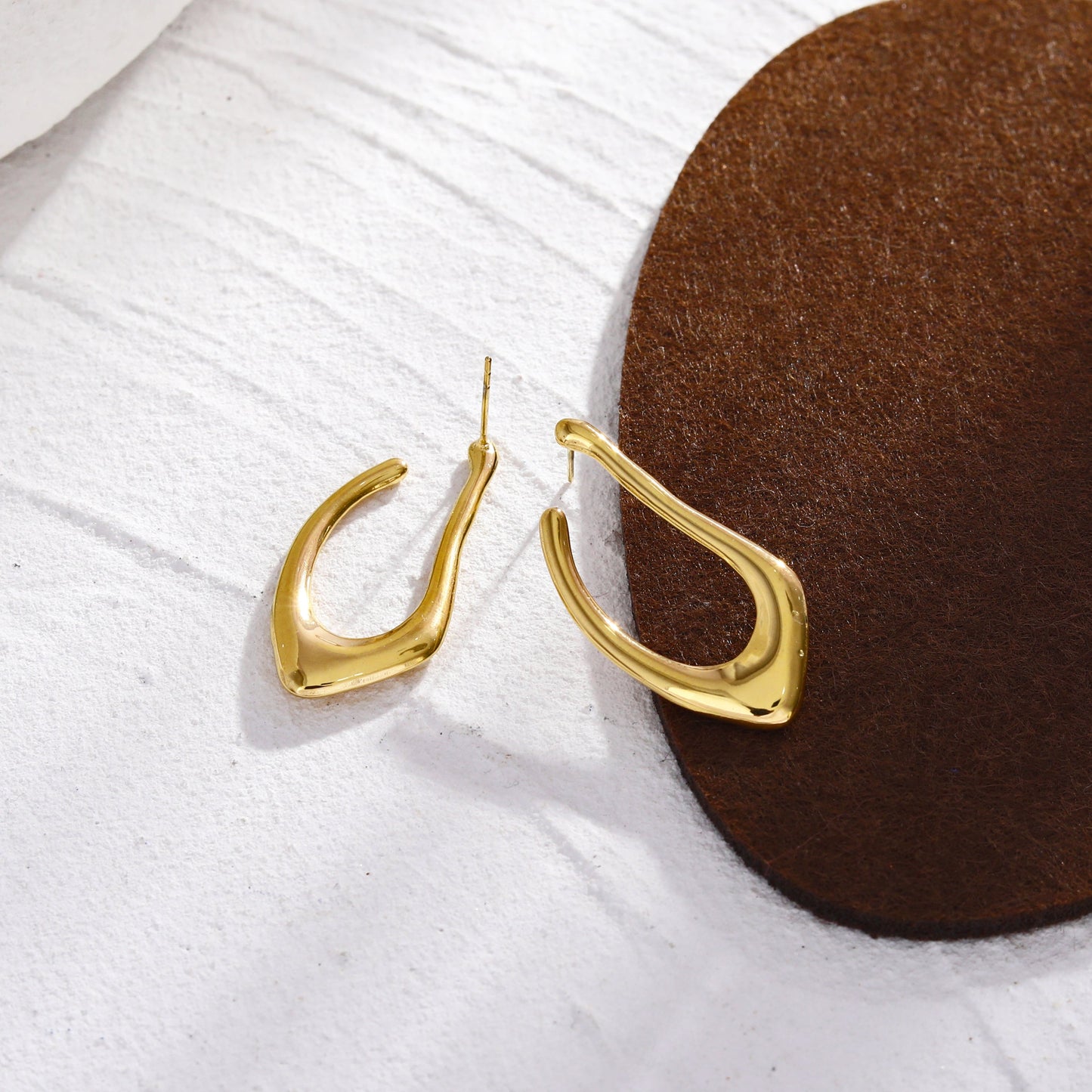 TARAJI Abstract Shaped Hoop Earrings in Gold