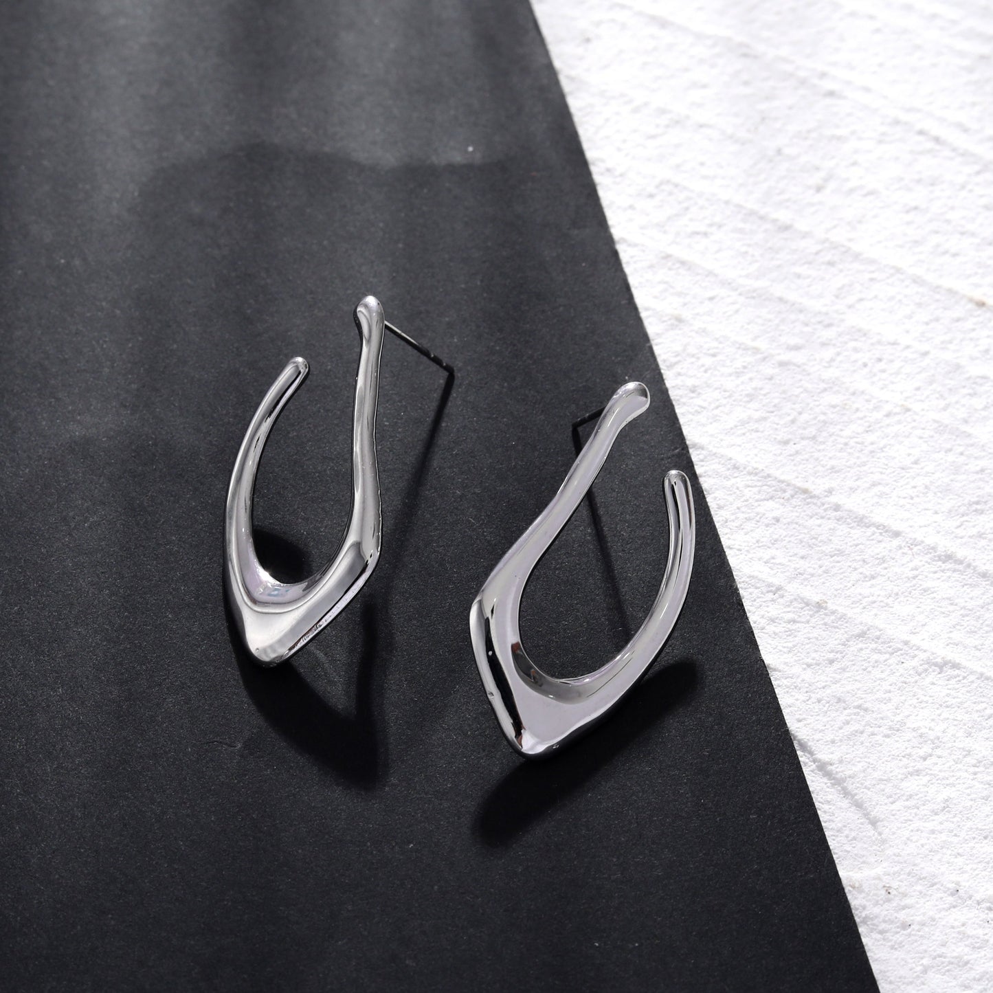 TARAJI Abstract Shaped Hoop Earrings in Silver