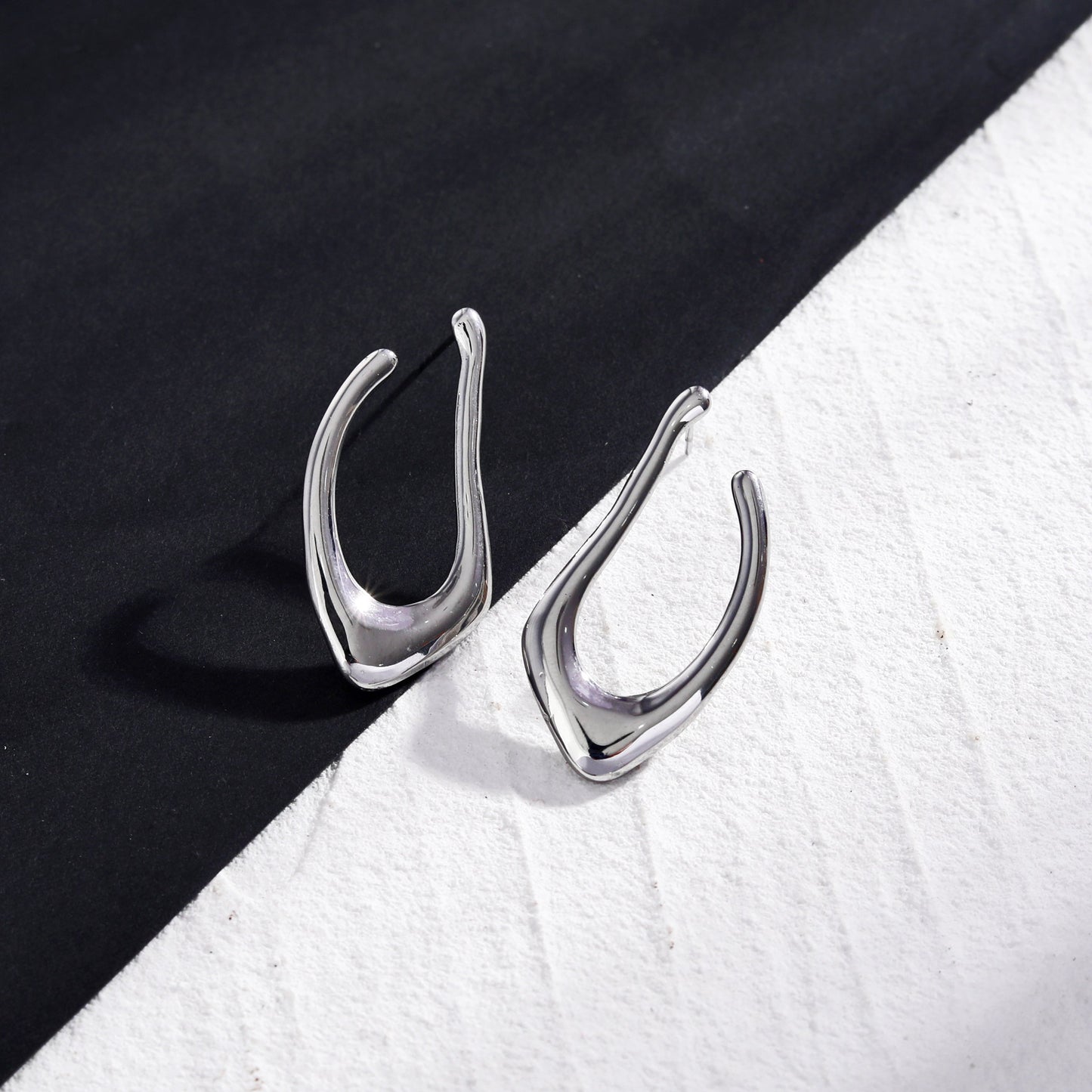 TARAJI Abstract Shaped Hoop Earrings in Silver